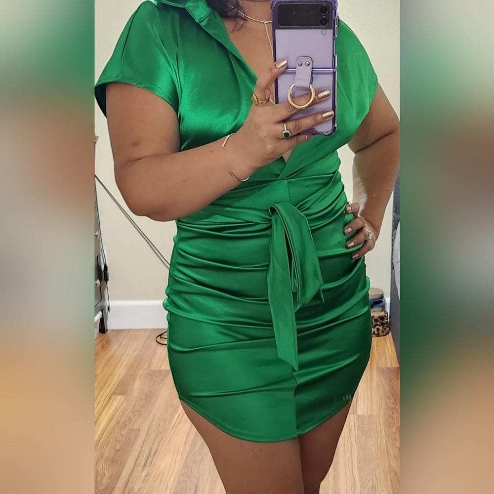 Short, tight light green dress